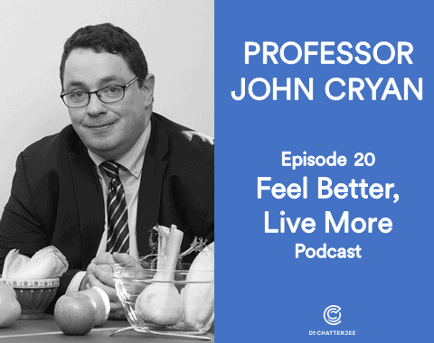 A man in a suit and tie sits at a table with vegetables, exploring topics like keto weight loss. Text reads: PROFESSOR JOHN CRYAN. Episode 20 Feel Better, Live More Podcast. The Dr Chatterjee logo is at the bottom.